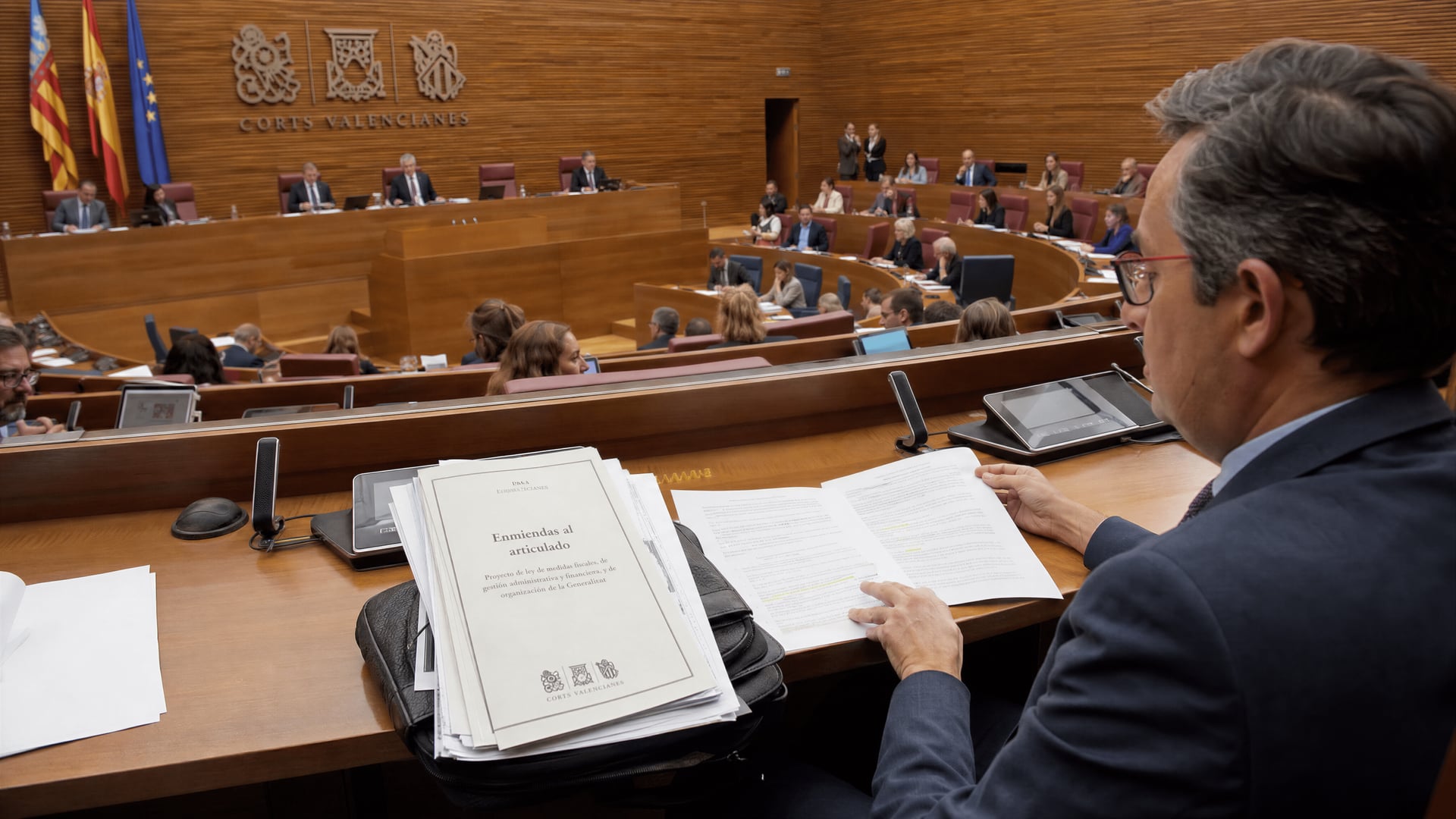 Corts Valencianes chamber with documents for the Valencian wealth-tax amendment